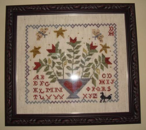 Glad Tidings stitched by DOnna Gay Harris.