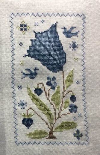 Woodland Berries stitched in blue by Ton Wolswijk.