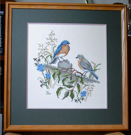 Bluebirds of Happiness from the Crossed Wing Collection.