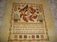 Adaptation of Garland Fair stitched by Carla Coburn.