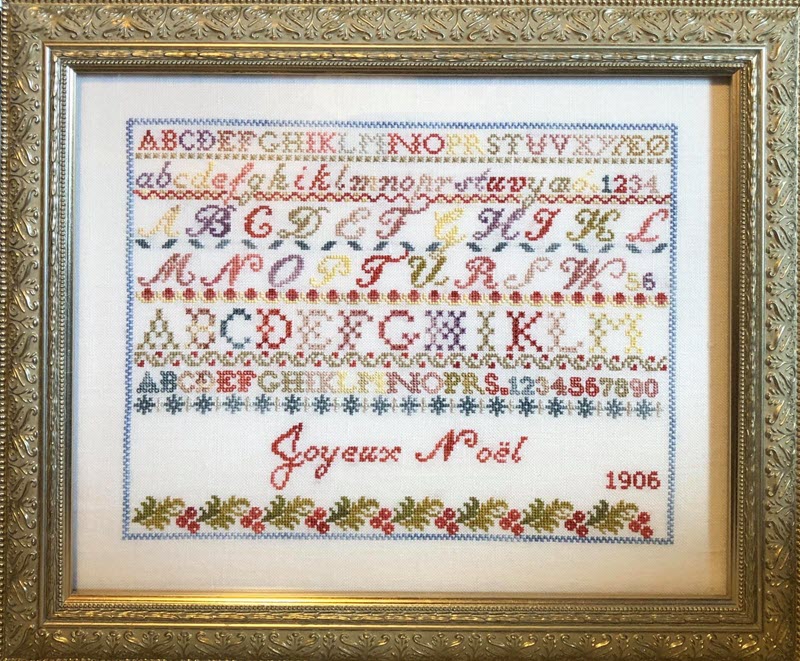 Joyeux Noel Sampler stitched by Debbie Kennedy.