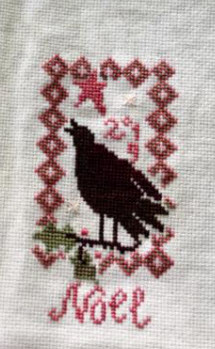 Noel stitched by Mindy Daubert.