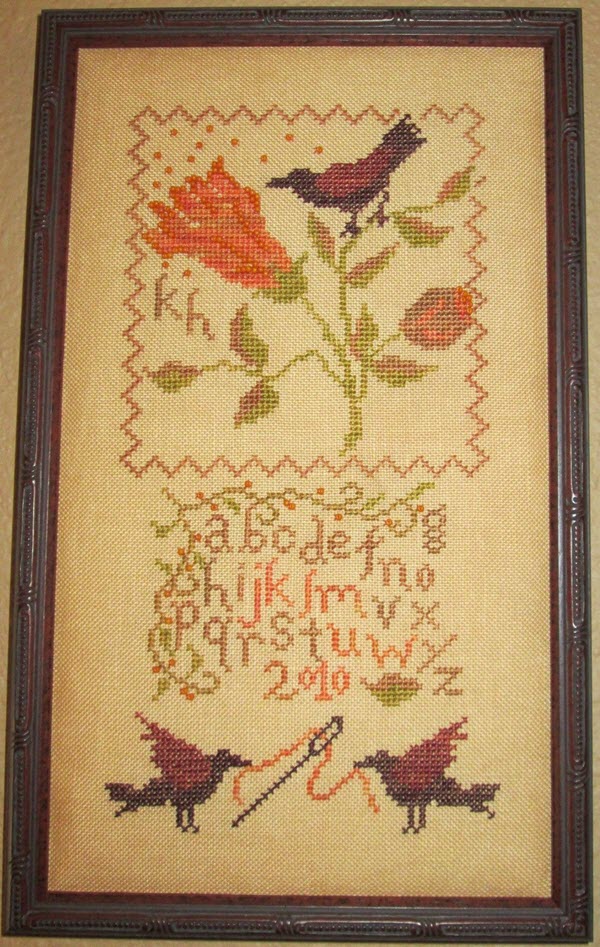 Pumpkin Blossom Needlecase stitched as sampler.