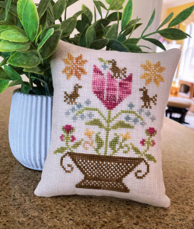 Summer Basket Pillow stitched by Lori Turner.