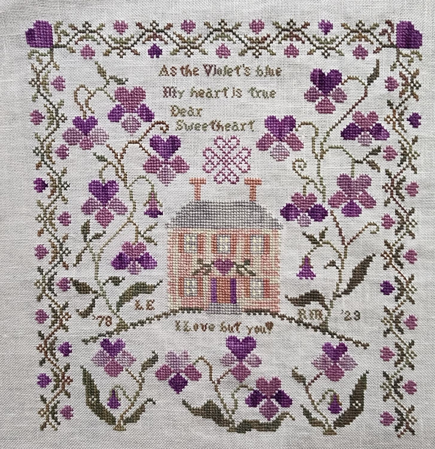 Violets Blue stitched by Irene Lisa Morris.